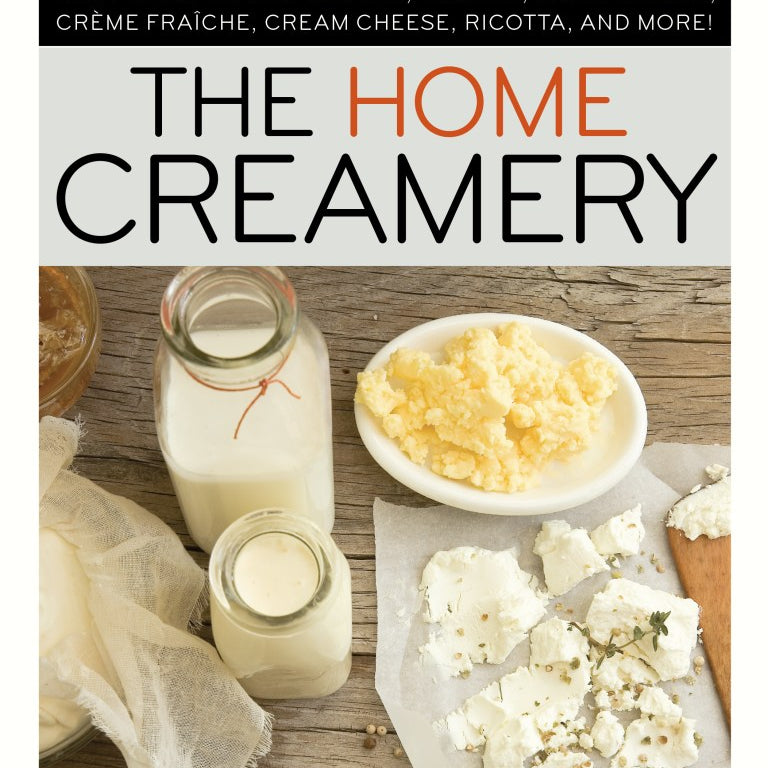 Book cover of 'The Home Creamery' with dairy products on a wooden surface.