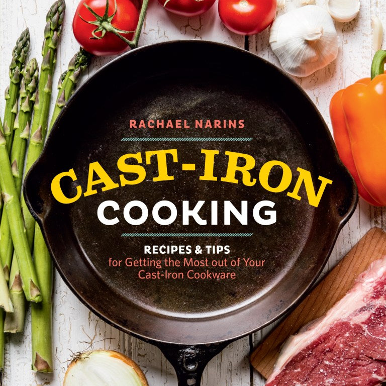 Cookbook cover of 'Cast-Iron Cooking' with a cast-iron skillet, vegetables, and meat on a white background.