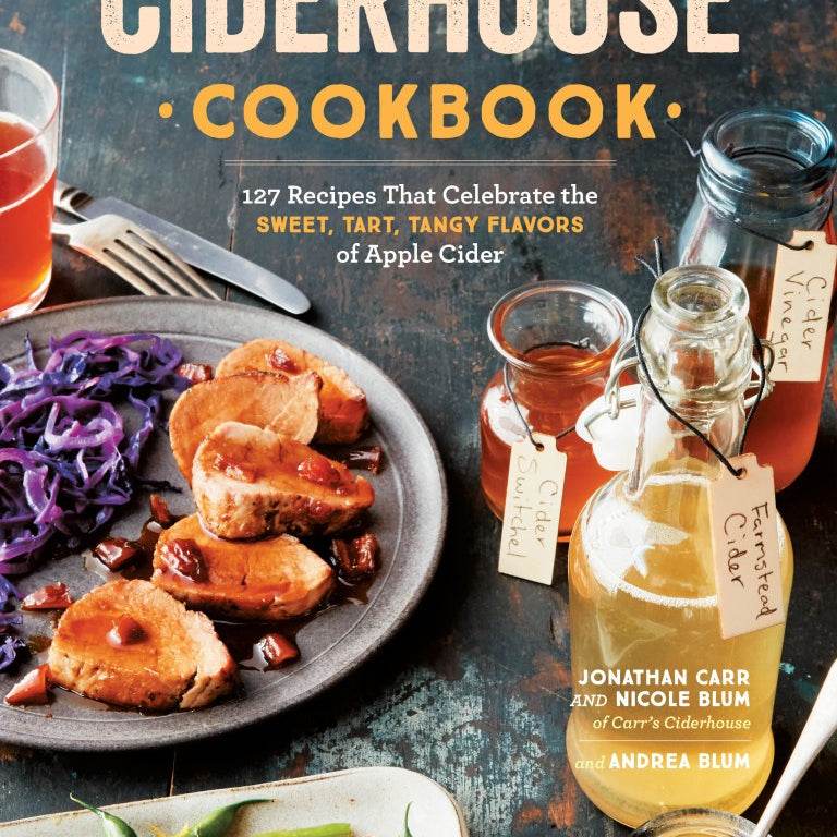 Ciderhouse Cookbook cover with food and cider bottles on a dark background