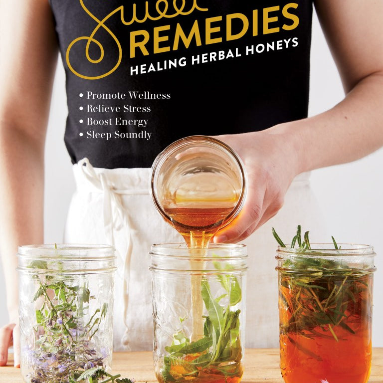 Person pouring honey into jars of herbal mixtures On a white background. Cover of  'Sweet Remedies' book. 
