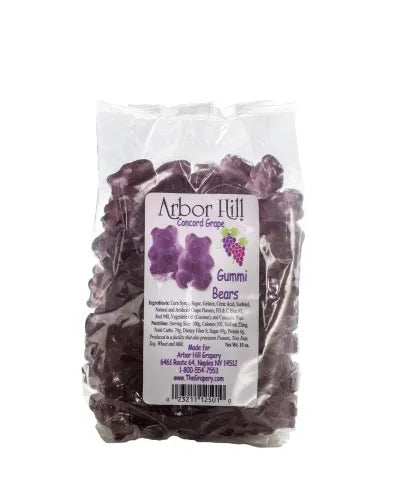 Bag of purple gummy bears with a label on a white background