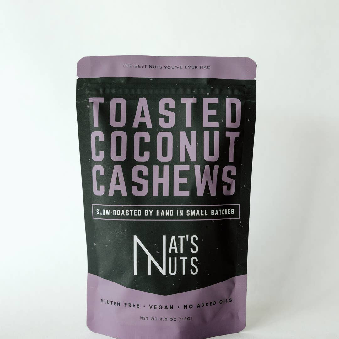 Bag of toasted coconut cashews with 'Nat's Nuts' branding on a white background
