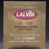 Brown packet of k1-v1116 yeast from Lalvin on a dark background