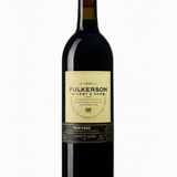 bottle of Fulkerson Meritage wine with cream and black label on a white background