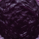 Close-up of dark purple liquid with a swirling pattern