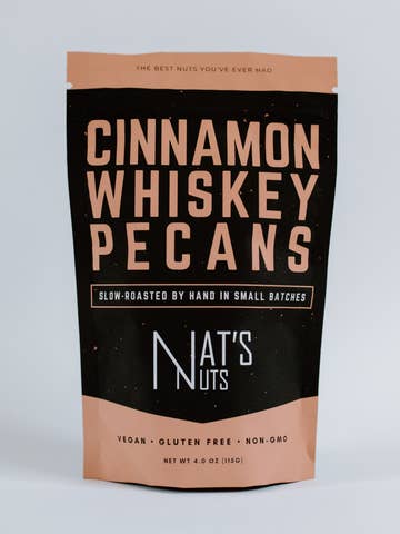 Bag of cinnamon whiskey pecans with 'Nat's Nuts' branding on a light gray background