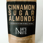 Packaging of cinnamon sugar almonds from Nat's Nuts on a white background