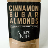 Packaging of cinnamon sugar almonds from Nat's Nuts on a white background
