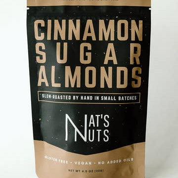 Packaging of cinnamon sugar almonds from Nat's Nuts on a white background