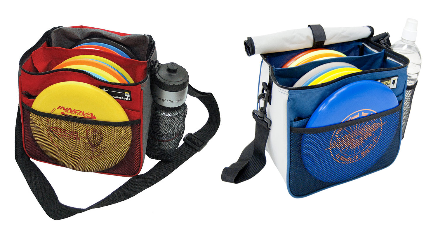 Two disc golf bags, one red and one blue, with discs and water bottles inside on a white background.