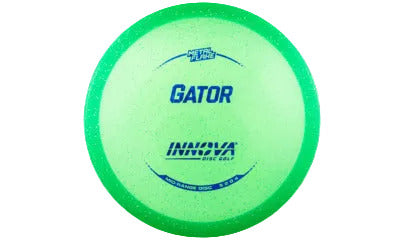 Green disc golf disc with 'Gator' and 'Innova' branding on a transparent background