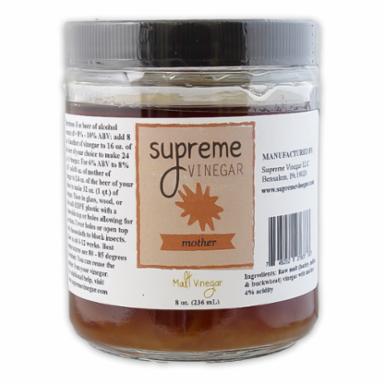 Jar of 'Supreme Vinegar' with a label on a white background