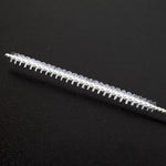 Siphon tube brush on a black background