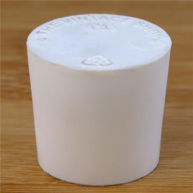 Solid rubber stopper on a wooden background