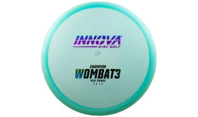 Teal "WOmbat3" disc golf disc with 'Innova' branding on a transparent background