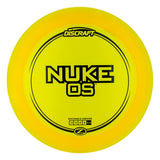 Yellow Discraft Nuke OS disc golf disc on a white background